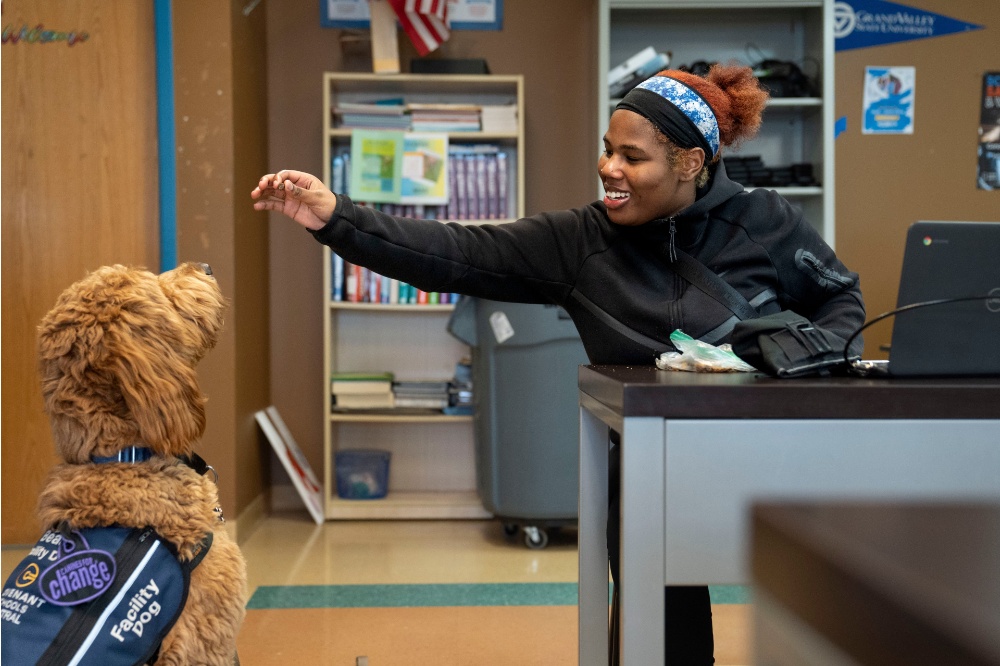 A calm presence, a lasting impact: Beau supports students at Covenant High School